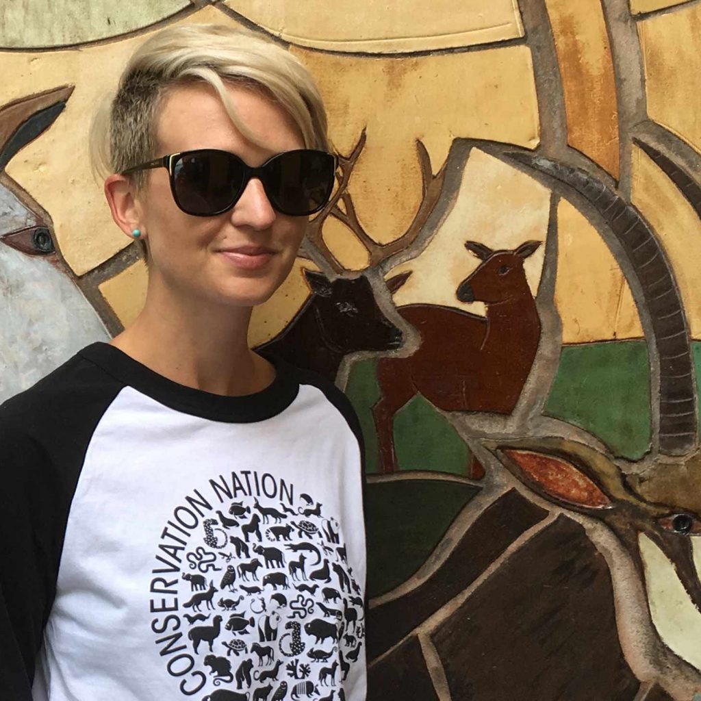Courtney wearing a Conservation Nation shirt