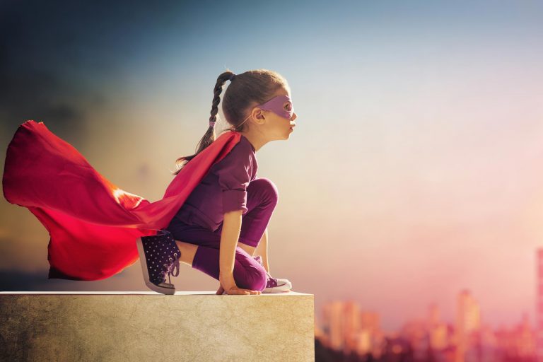 girl dressed as superhero