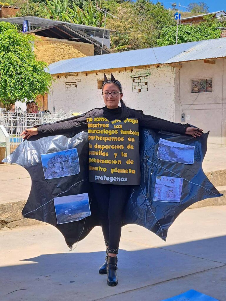 a young female student wearing a bat costume