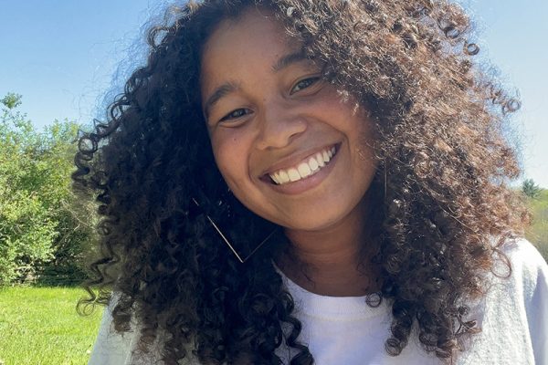 Conservation Nation grantee Tatjana Washington in a grassy field